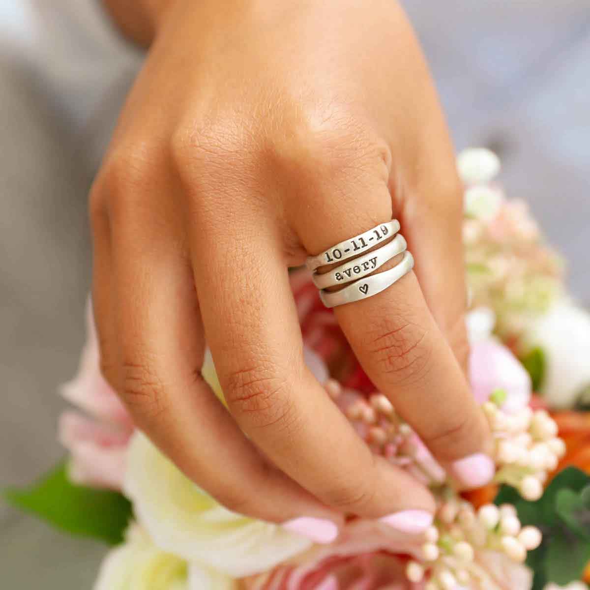 Mother wearing Lisa Leonard Stacking Rings